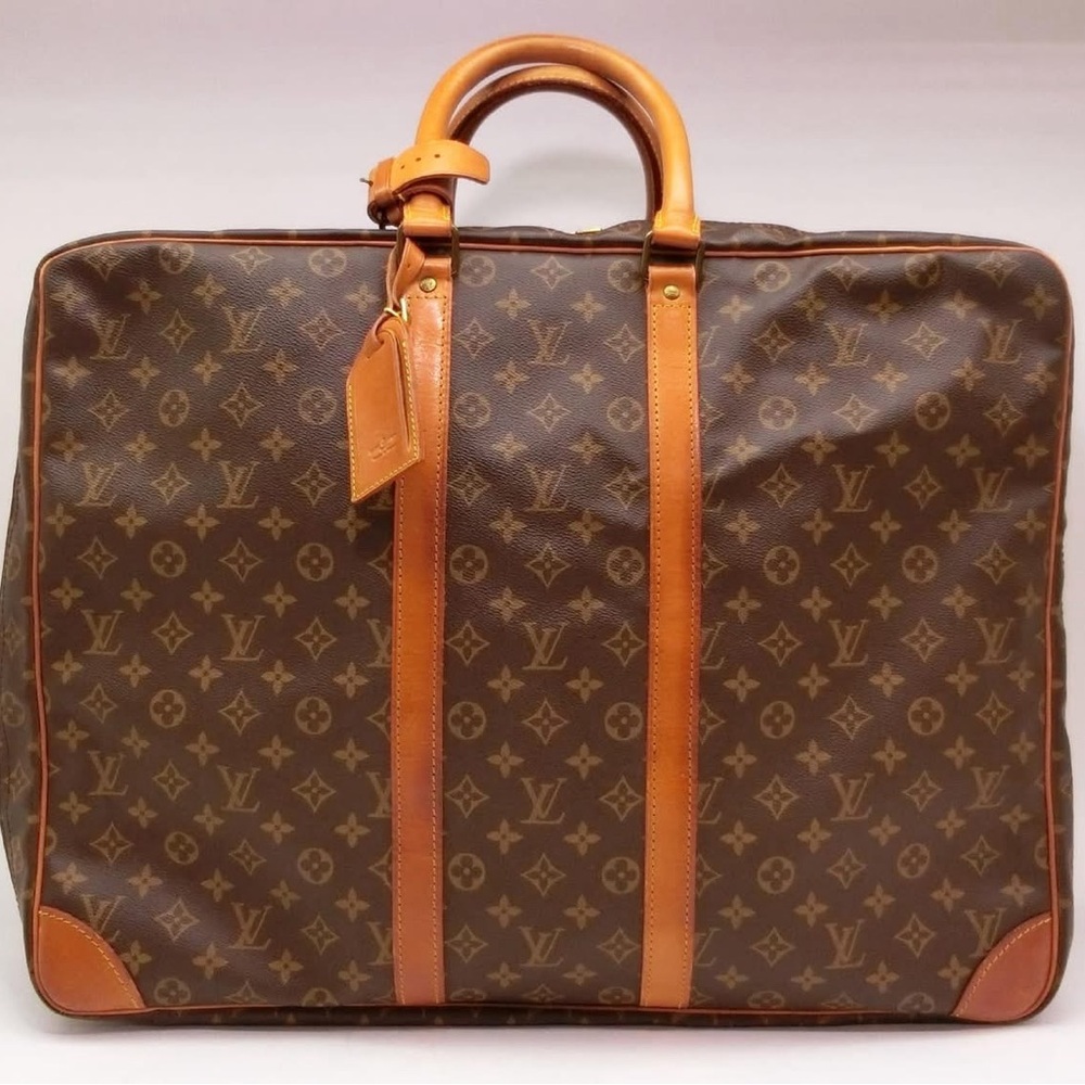 Louis Vuitton - Monogram Sirius 70 
c: 1980s–1990s